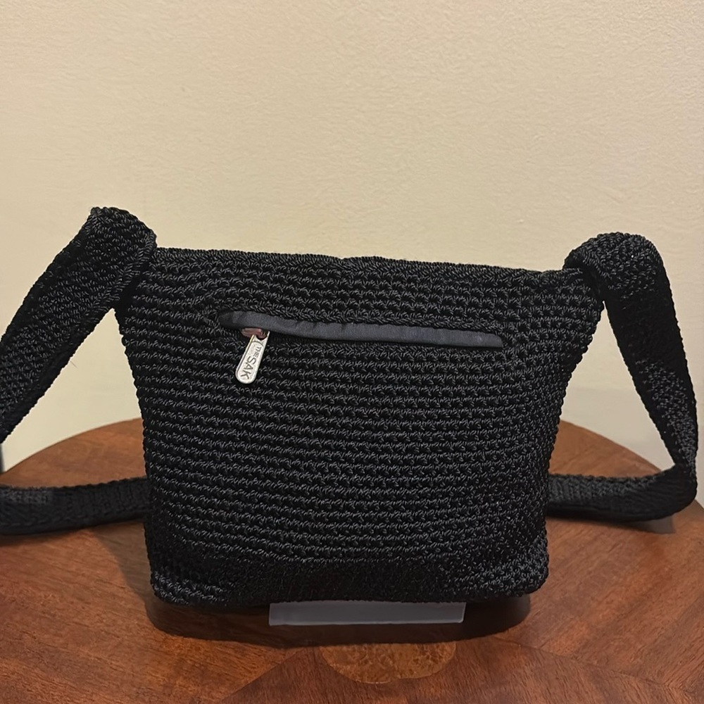 The SAK  shoulder bag  Small  crochet Black   nylon lining  exterior pocket NWOT